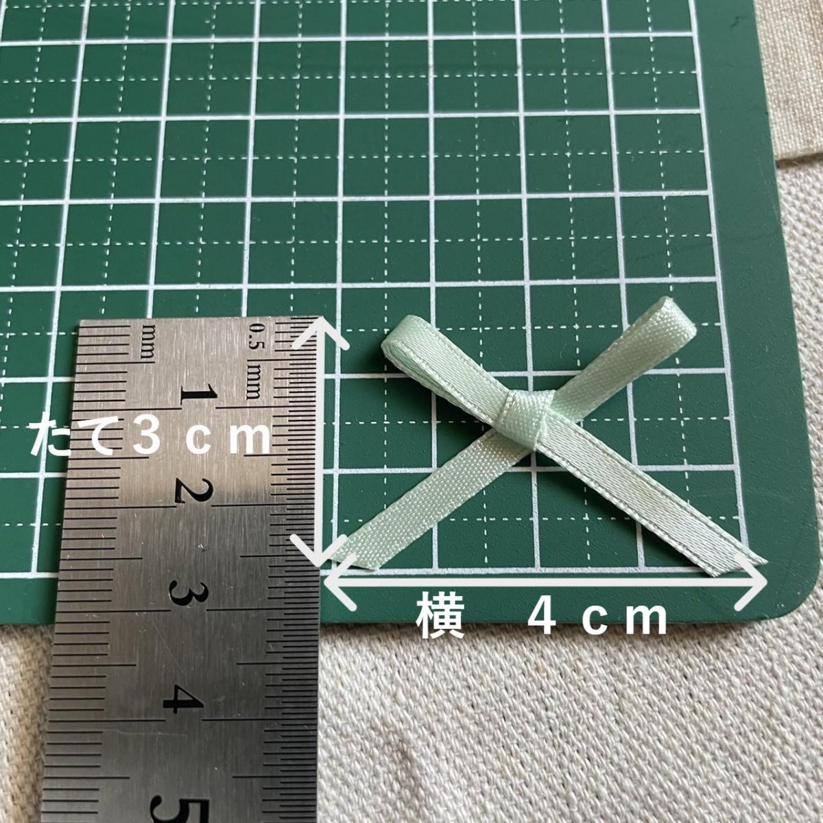 画像1: 100個！可愛いリボンモチーフ　ペパーミントグリーン　ハンドメイドに　たて約3cm×横約4cm (1)