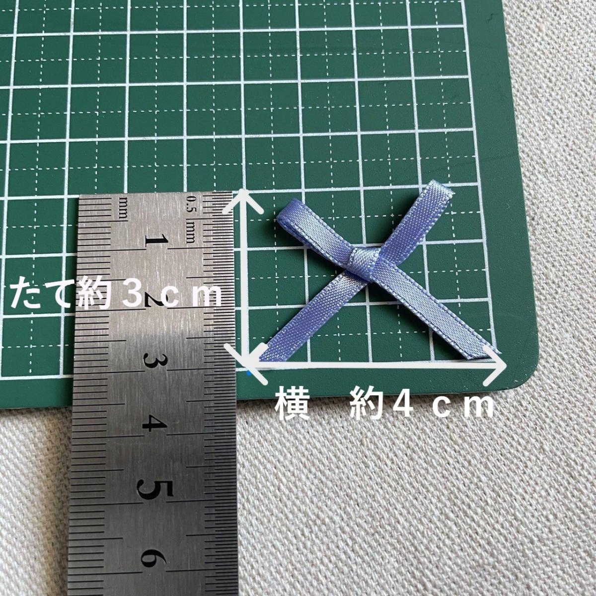 画像1: 90個！可愛いリボンモチーフ　パープル　ハンドメイドに　たて約3cm×横約4cm (1)